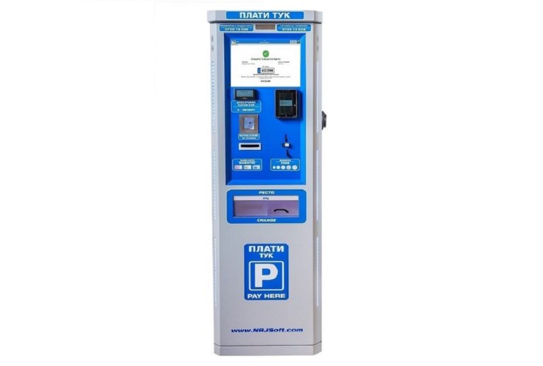 Parking pay station with a charger